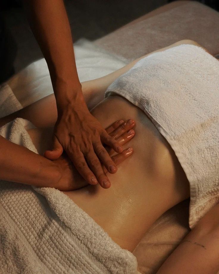 Brazilian lymphatic drainage abdominal massage at Flow & Glow Wellness